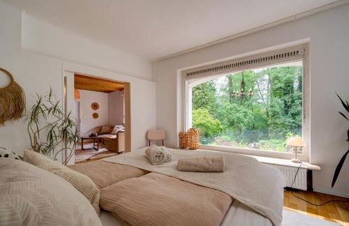 Beheizter Whirlpool und Panoramafenster vom Bett ins Grüne! - Foto 5