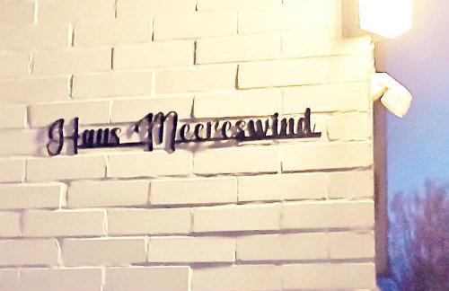 Haus Meereswind Esens, Wintergarten mit Kamin - Foto 17