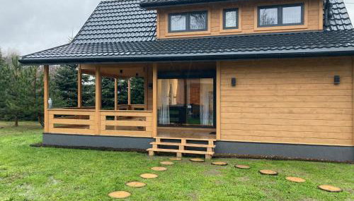 Domek drewniany nad stawem - Foto 4