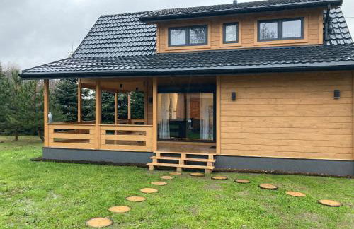 Domek drewniany nad stawem - Foto 4