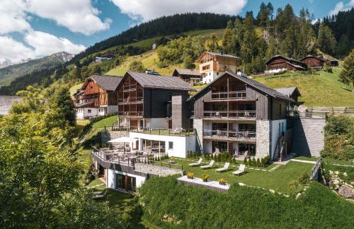 Les Dolomites Mountain Lodges - Photo 11