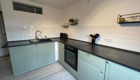 Ferienwohnung in der Wülfrather Altstadt - Foto 4, stove