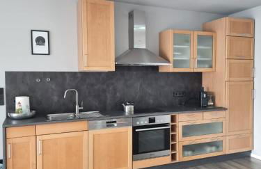 Gemütliche Ferienwohnung mit 1 Schlafzimmer, Wohnzimmer mit Schlafcouch & voll ausgestattete Küche - Foto 18