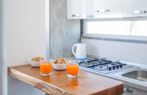 Arricàmpati Apartments Villa & Bringo Car Rental - Foto 19