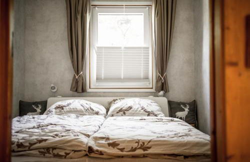 Hüttenflair am See mit Kamin - Foto 23