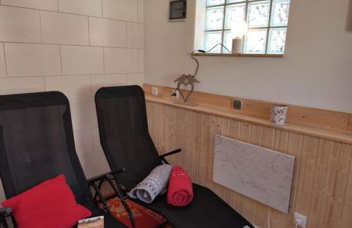 Ferienhaus Blaue Blume mit 11 kW Ladestation, Kamin, Terrasse, eingezäuntem Garten, Sauna, WLAN, Netflix, 2 Hunde willkommen! - Foto 40