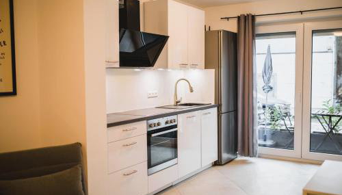 HUGOS Studio Apartment - Photo 4