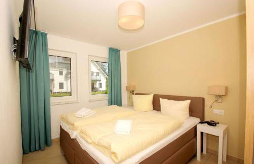 Strandresort Rex Rugia Ferienwohnung 11-2 mit Sauna- und Schwimmbadnutzung im AHOI Sellin - Foto 9