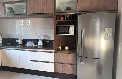 Sobrado top com piscina, espaço gourmet, próximo à praia com Ar Condicionado - Foto 13