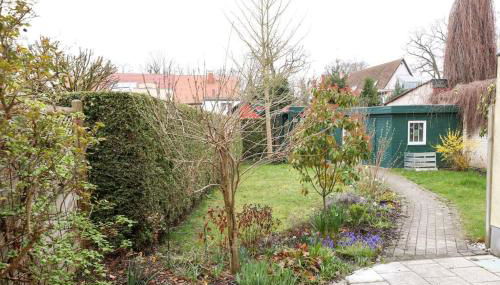 Freundliche Wohnung mit Parkplatz und Terrasse - Foto 3, Garden view