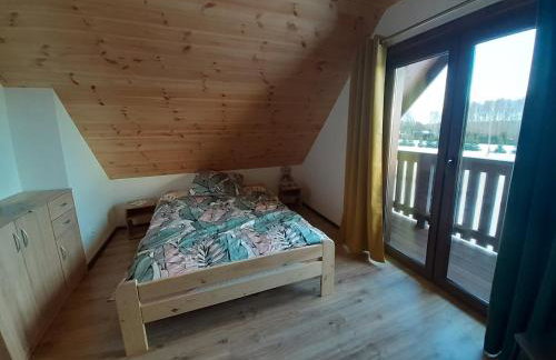 Agroturystyka '' U Adasia i Marysi '' - Domek nad jeziorem - Foto 24