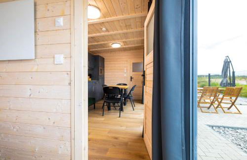 NORA Stays Tiny House direkt am See - Sauna - Klima - Foto 16