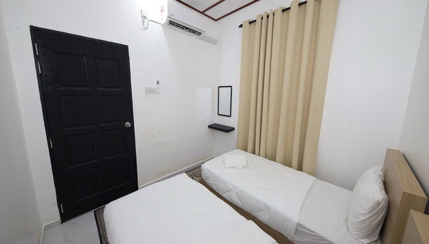 OYO 90976 Pantaistay baturakit - Foto 5, Habitación