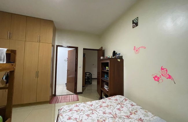 The Mugabi's Spacious Private Room - Foto 6