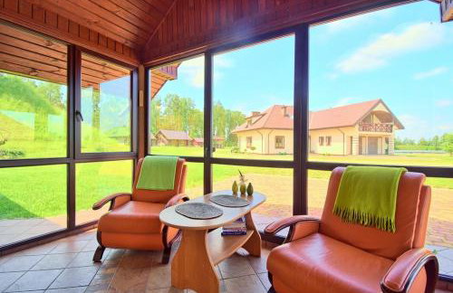 Dom nad stawem przy lesie - Foto 26