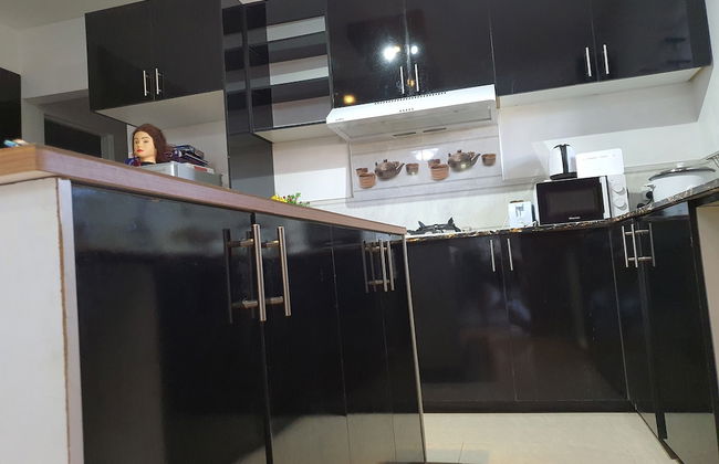 Master Bedroom with Shared Kitchen - Photo 30