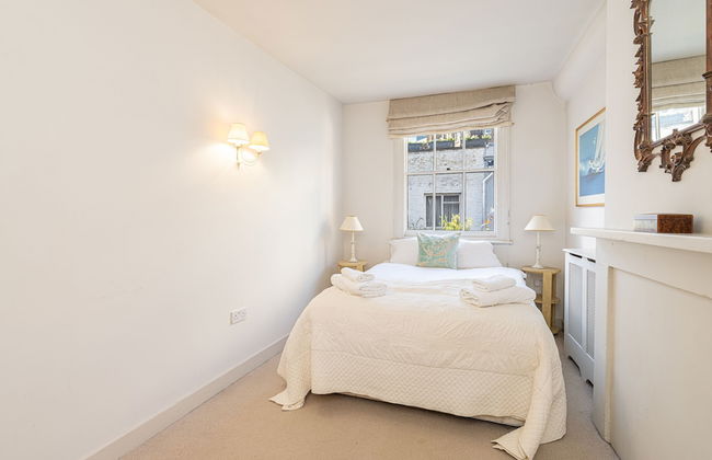 JOIVY Elegant 2-Bed Mews Flat Near Buckingham Palace - Photo 5