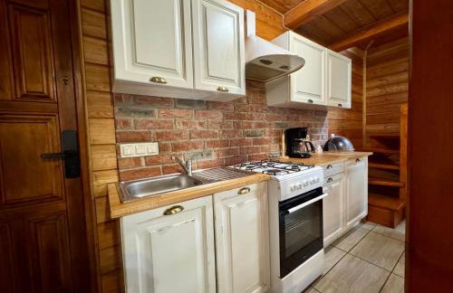 Drewniany zakątek - domek z sauną i balią - Foto 13