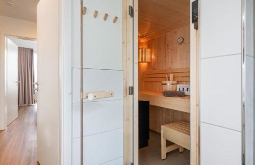 Hygge – Familienfreundliche Ferienwohnung mit Garten & Meerblick - Foto 9