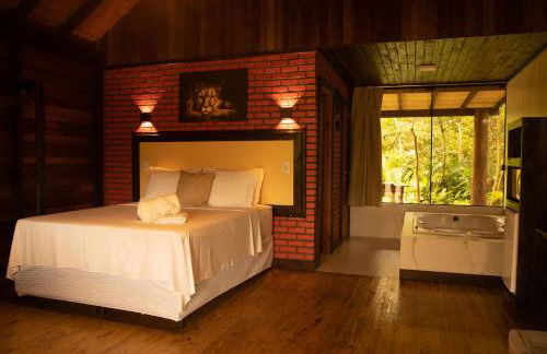 Chalé Canadense com Hidromassagem Pousada Índios Koroados - Foto 6