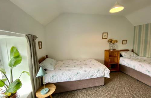 Charming coastal cottage - pet friendly! - Photo 17