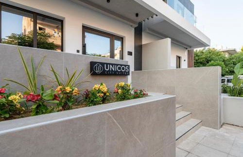 Unicos City Suites - Photo 5