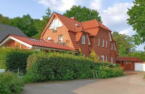 Moderne Ferienwohnung mit Kamin u Garten im EG 100qm Nähe Weser und Golfplatz - Foto 1