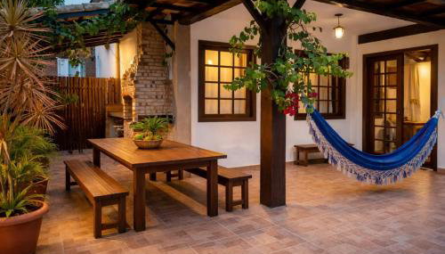 Casa charmosa em condomínio com piscina, churrasqueira e 3 banheiros a 5 min da praia em Manguinhos - Foto 2