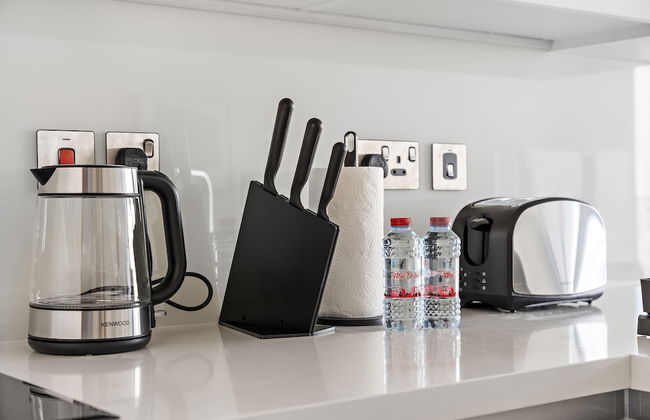 WelHome - Seaside Serenity: Spacious 1 BR in Maritime City - Photo 10