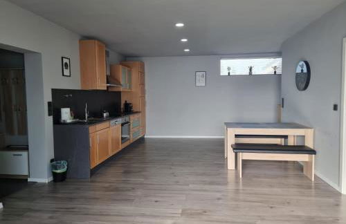 Gemütliche Ferienwohnung mit 1 Schlafzimmer, Wohnzimmer mit Schlafcouch & voll ausgestattete Küche - Foto 15