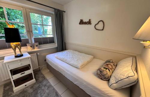 Sky & Sand Homes Sturmmöwe I Reetdach-Refugium mit Parkgarten in SPO - Photo 24