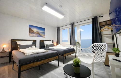 STN Kocherwald Suite - Ferienwohnung mit 4 Schlafzimmer, 8 Big Beds, Parkplatz & Balkon, Highspeed WLAN, Netflix Premium, Zentral zu Audi & Schwarz Gruppe - Foto 8