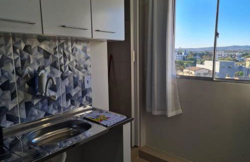 Kitnet404 central, com tv smart,linda vista para janela - Foto 11