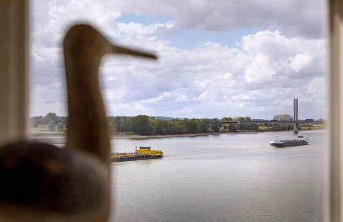 Fährmann im Häuschen am Rhein - Foto 5