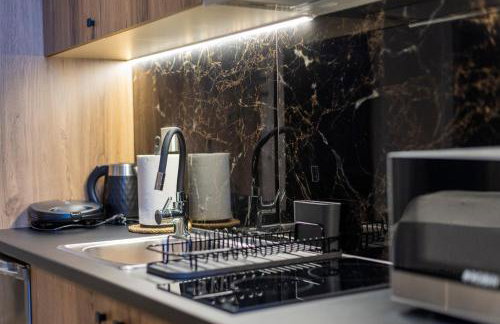 Omega Suites 31 - Photo 29