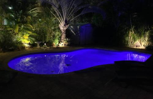 Palm Paradise-Seaside Home w Heated Saltwater Pool - Photo 21