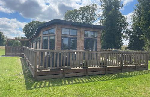 Glasshouse hot tub lodge - Foto 1