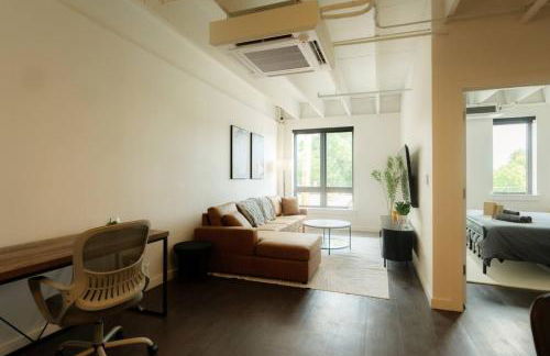 Above The Roots - Sophisticated 1BD Retreat - Photo 43