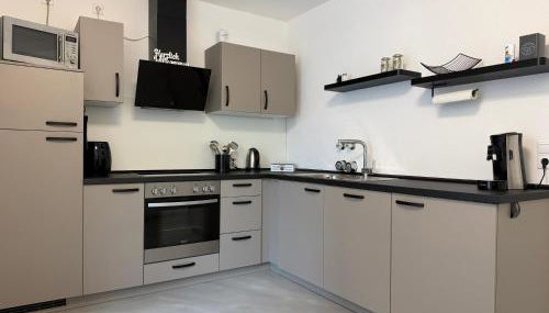 Ferienwohnung mit Garten und Parkplatz mitten in Neumarkt - Foto 5, furniture, stove, dishwasher, toaster