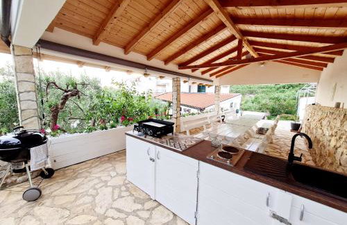 Vila Maslina Apartments mit Pool und Garten nahe am Strand - Foto 14