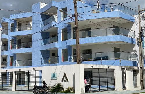 No Atalaia, Fort Poseidon rua do Atalho a 700 metros da praia do Atalaia, apartamento novo decorado, varanda, sala de estar e jantar, 02 suítes, 03 banheiros, lavanderia, cozinha, piscina, churrasqueira, salão de jogos, vista parcial das dunas e mar - Photo 3