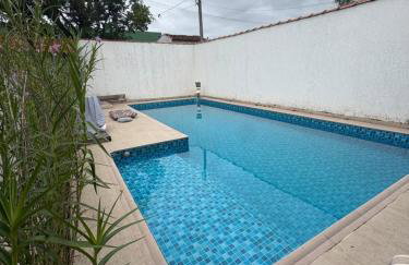 Casa Praia Grande 5min praia, 2 vagas, wi fi , 3 banheiros , piscina grande , freezer extra gelo , churrasqueira , até 9 pessoas - Photo 51