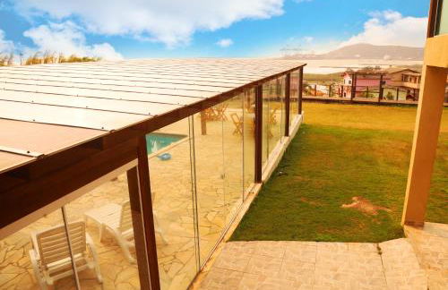 Chalé com Piscina Aquecida - Vista Panorâmica da Praia, a 200m do Mar, Sala de Jogos, Academia e Churrasqueira - Photo 18