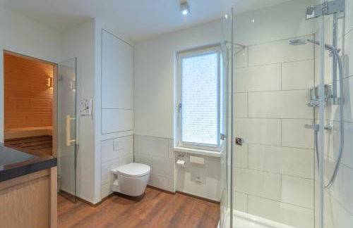 Ferienhaus direkt am See - Kamin, Klima, Sauna und Boot - Foto 17