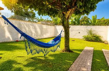 Casa Temporada Ubatuba perto da praia, check-in e out flexíveis com 5 vagas na garagem, wifi, churrasqueira - Foto 2