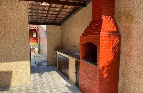 Ampla casa em condomínio a 300mt da praia - Foto 22