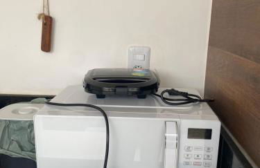 Suíte privativa aconchego a alguns passos da praia - Foto 12