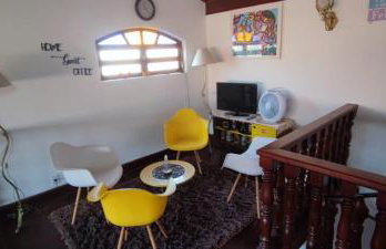 Casa Rosa de Peruíbe - Casa de Temporada 3 dormitórios, 10 hóspedes, piscina, wi-fi, netflix, 800 metros da praia - Photo 15