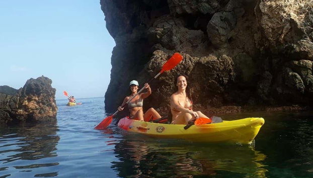 Kayaking towards the sea caves