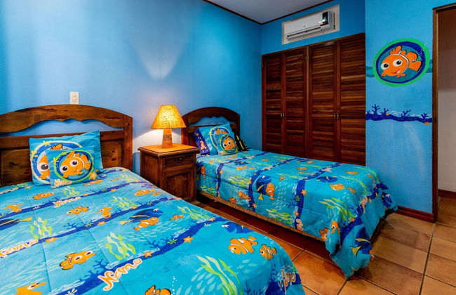 Beachfront Condo with Warm, Rustic Interiors & Direct Access to Playa Flamingo - Photo 7